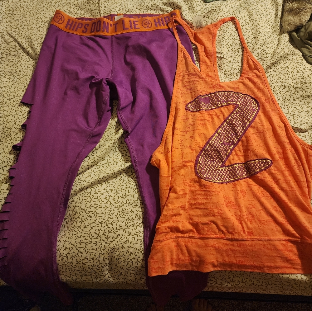Zumba purple slashed leggings xlovely and matching orange burnout ringer lovely